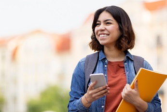 Young woman holding a phone